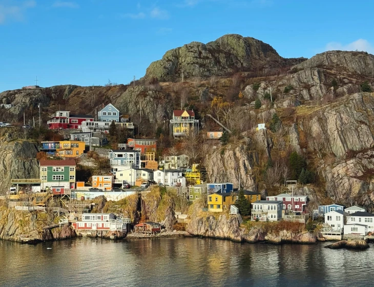 an island with lots of houses sitting on top of it