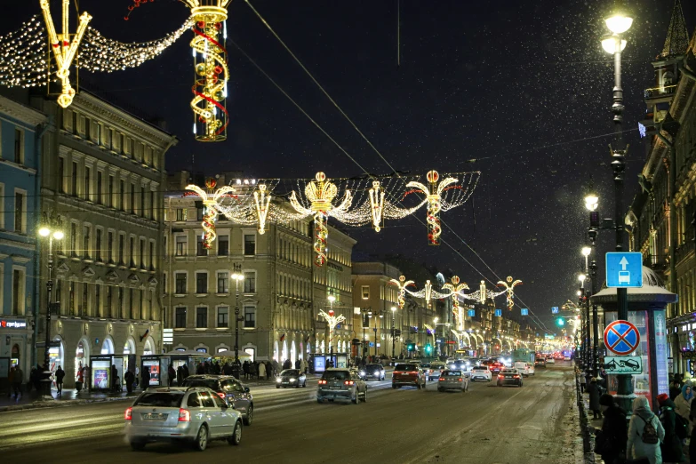 an empty street with lights and cars on it