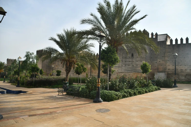 a very pretty square in front of a castle