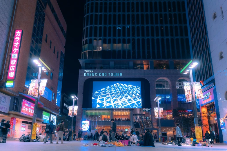 a large outdoor display is lit up at night