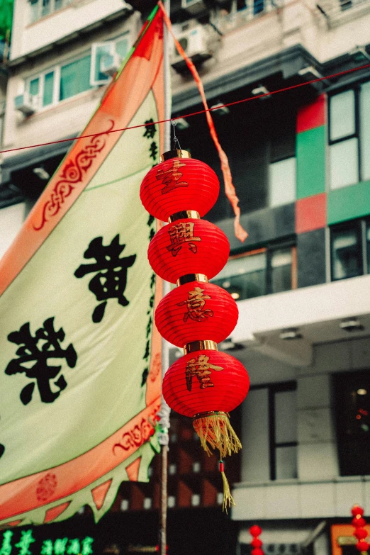 chinese lanterns in front of a el or building