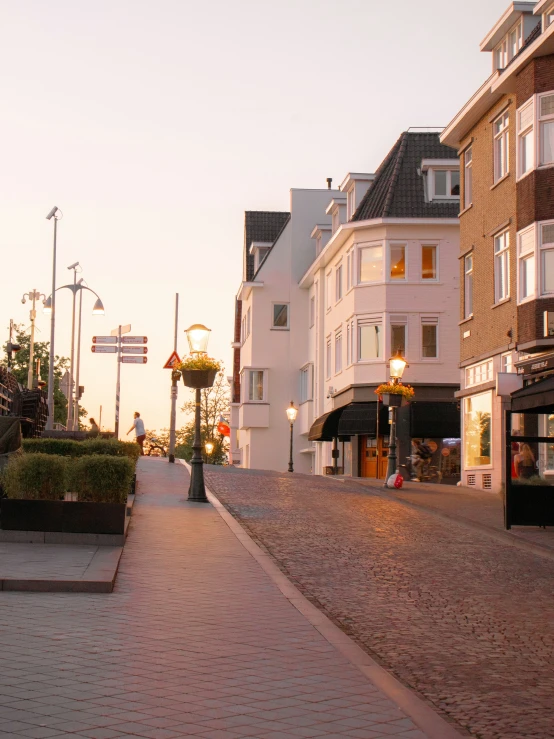 a city street lined with tall buildings