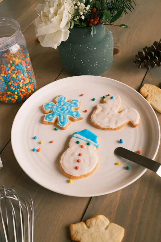 a plate with some cookies sitting on top of it