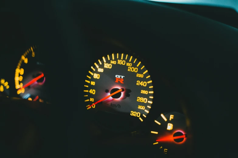 a car dashboard with a lot of instruments