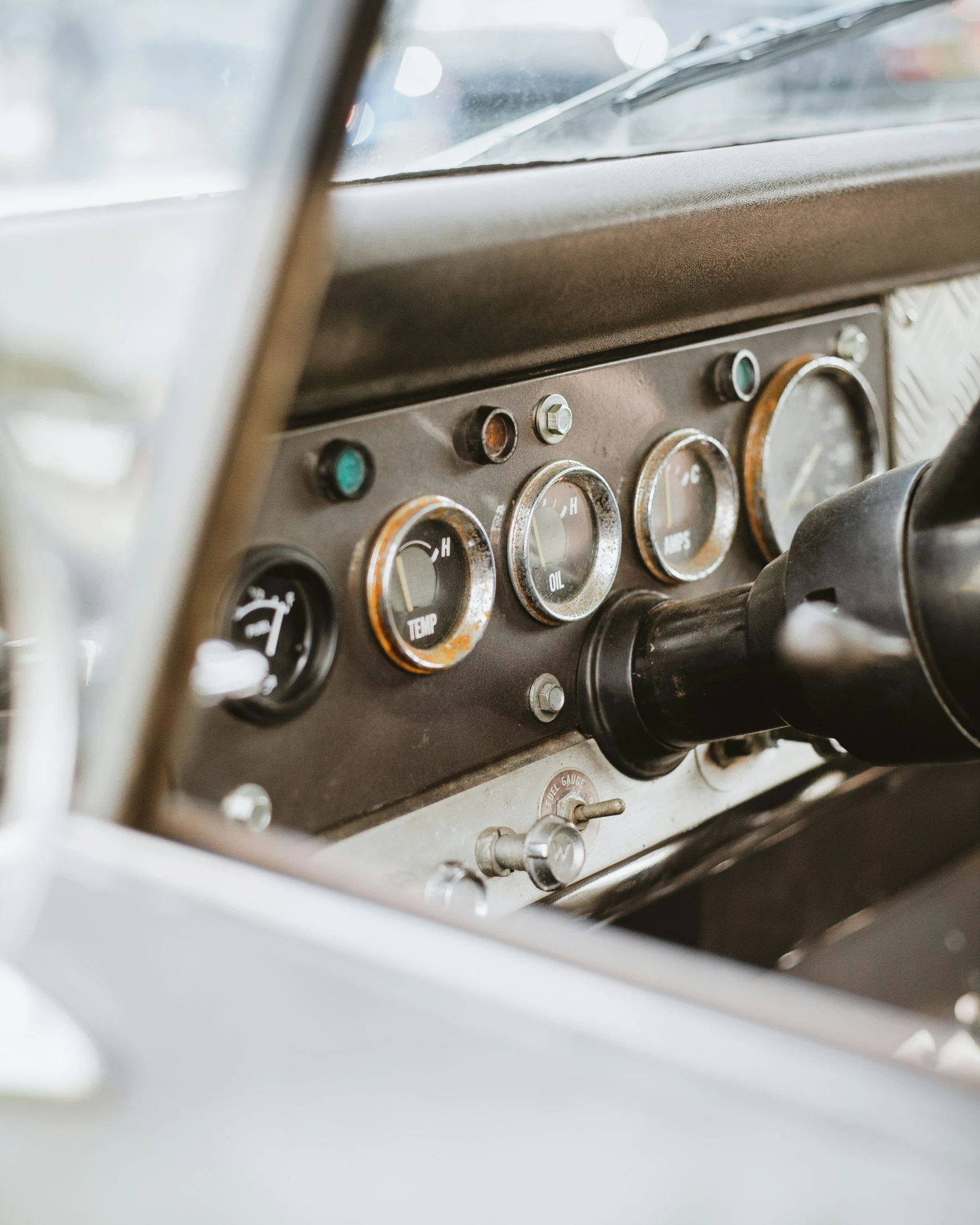 the inside of a vehicle, including steering wheel controls