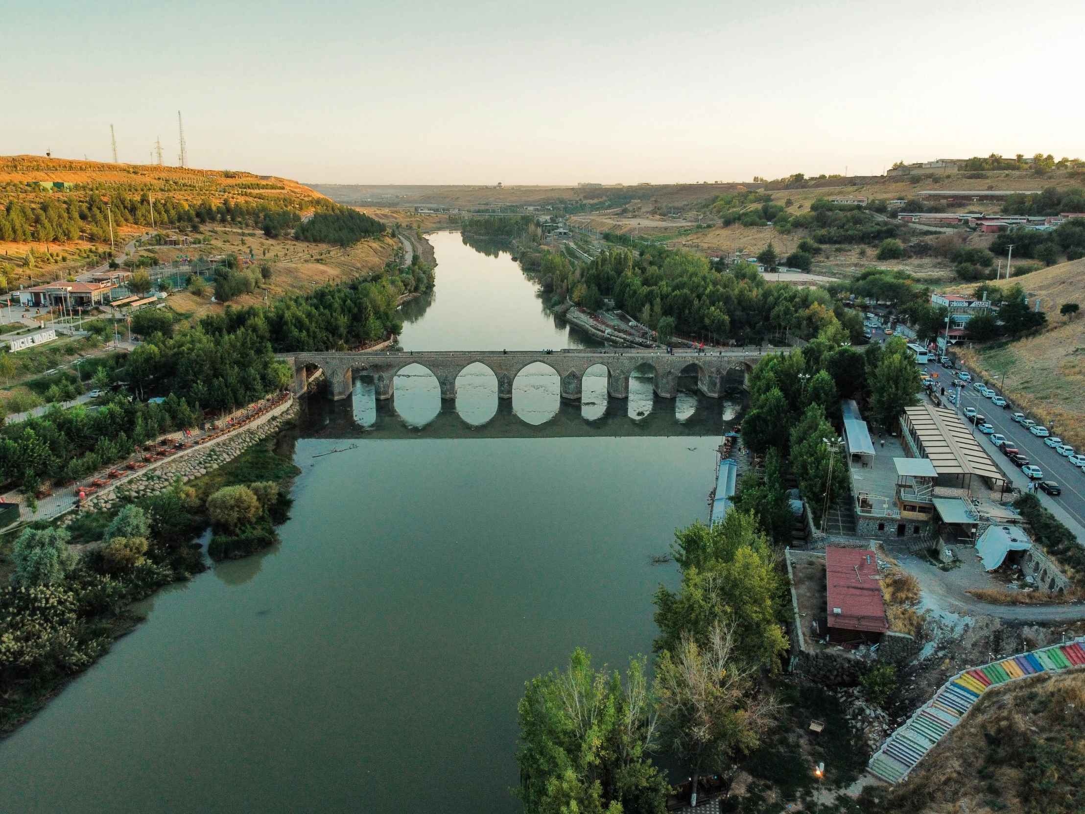 a view of a large bridge spanning over a river