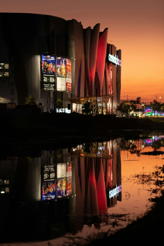 an image of an architecture building with reflections on the water