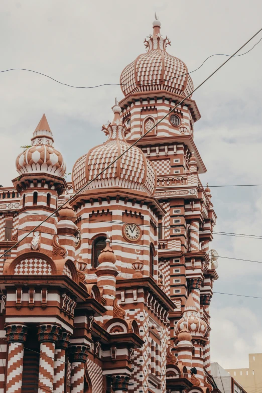 a building with large intricately designed towers and dome tops