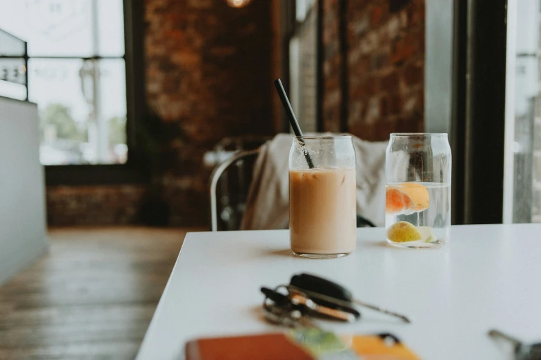 a table with drinks on it at a restaurant