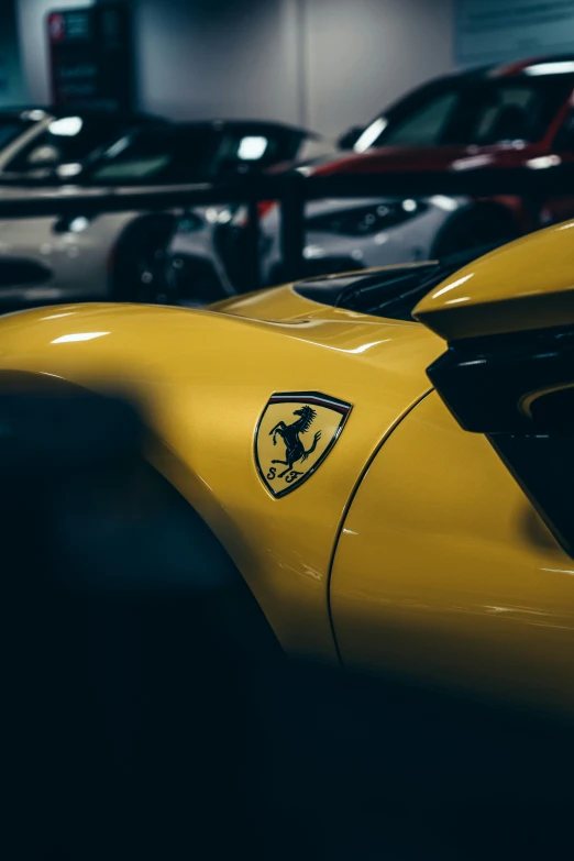 a bunch of cars that are parked in a parking garage