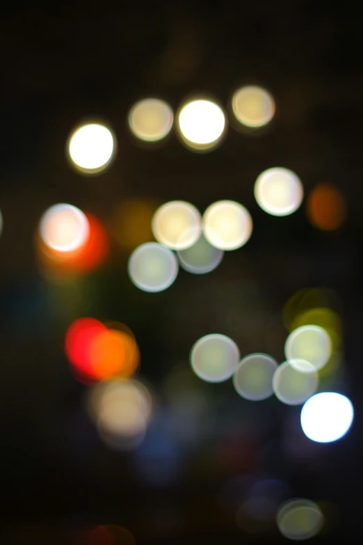 blurred lights are bright orange, white, and red