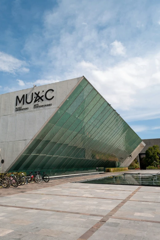 a building with a lot of bikes in front of it