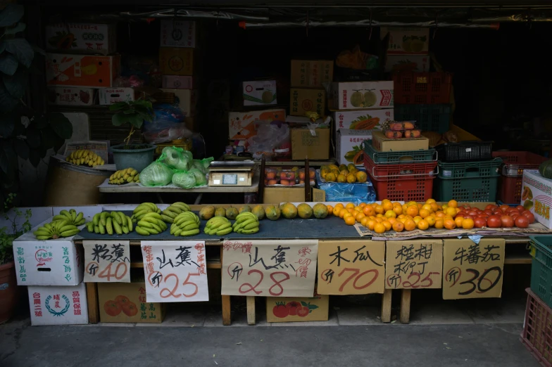 there are many different fruits on display in this shop