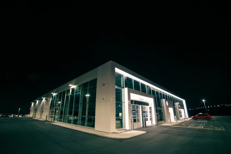 night time s of building at night, with lights on and a lot of windows