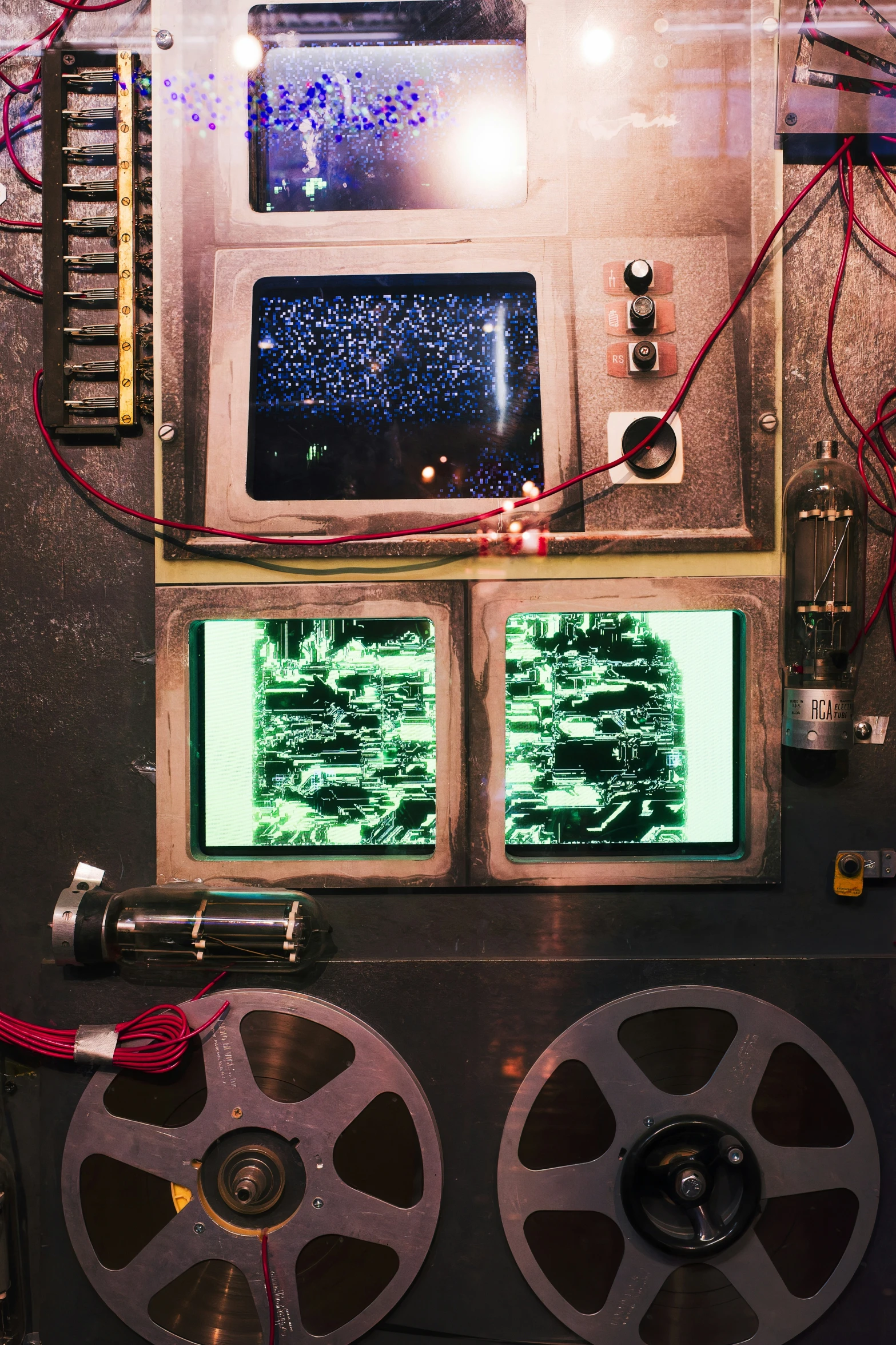 a set of monitors and other equipment in a building