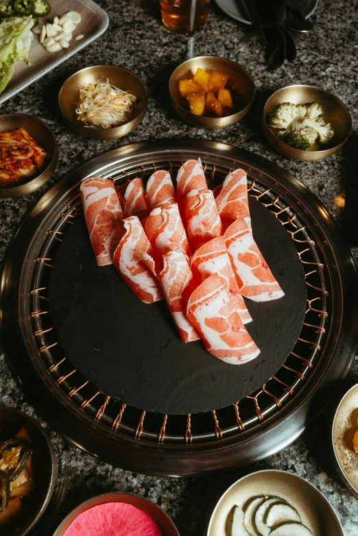 a pan of food and bowl of other foods