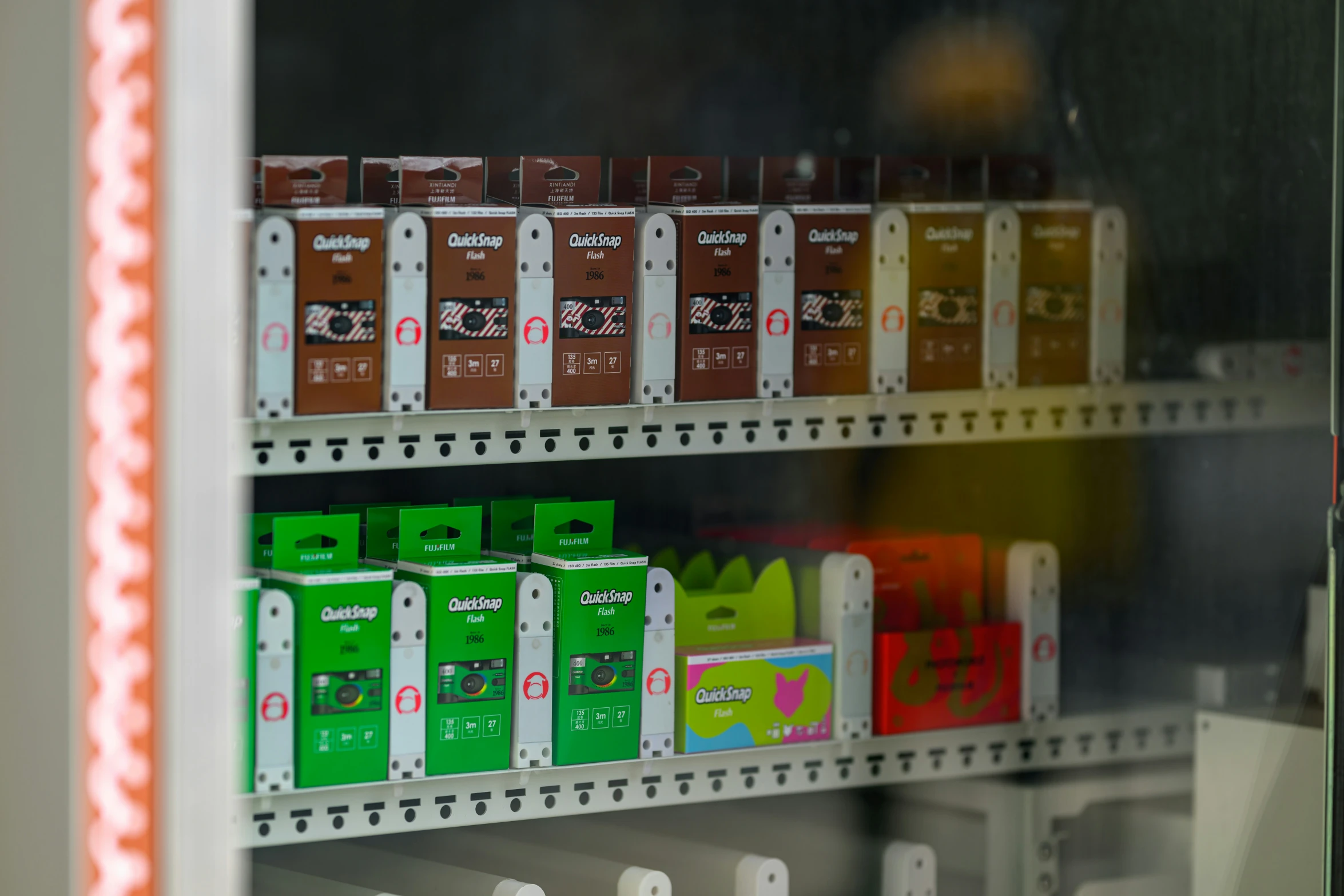 assorted candy boxes in the window display case