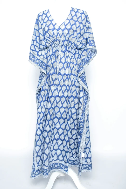 a dress on a dummye in blue and white