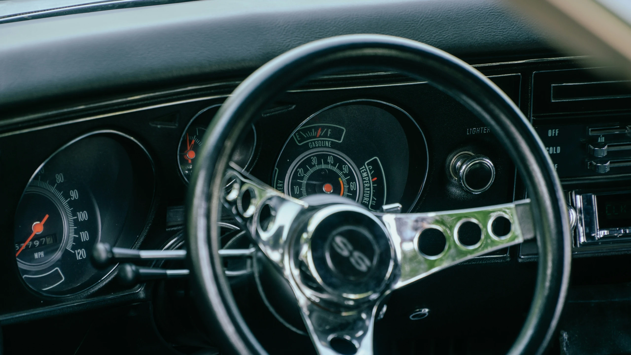 a car dashboard showing its meter and electronic display