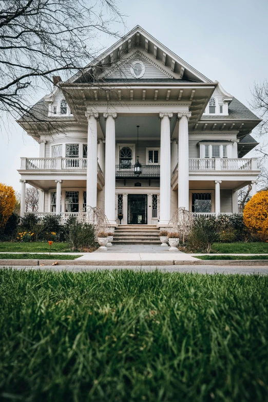 a very big pretty house with a lot of windows