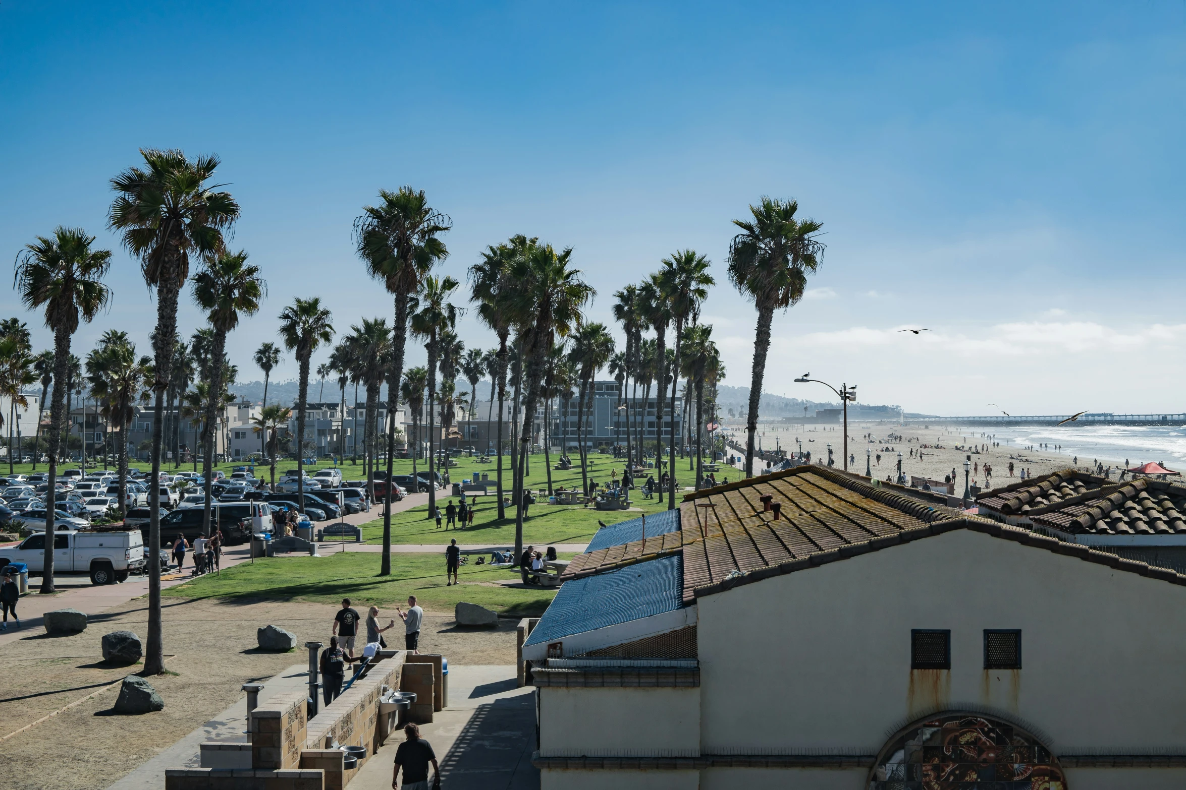 a view from the top of a rooftop of a beach