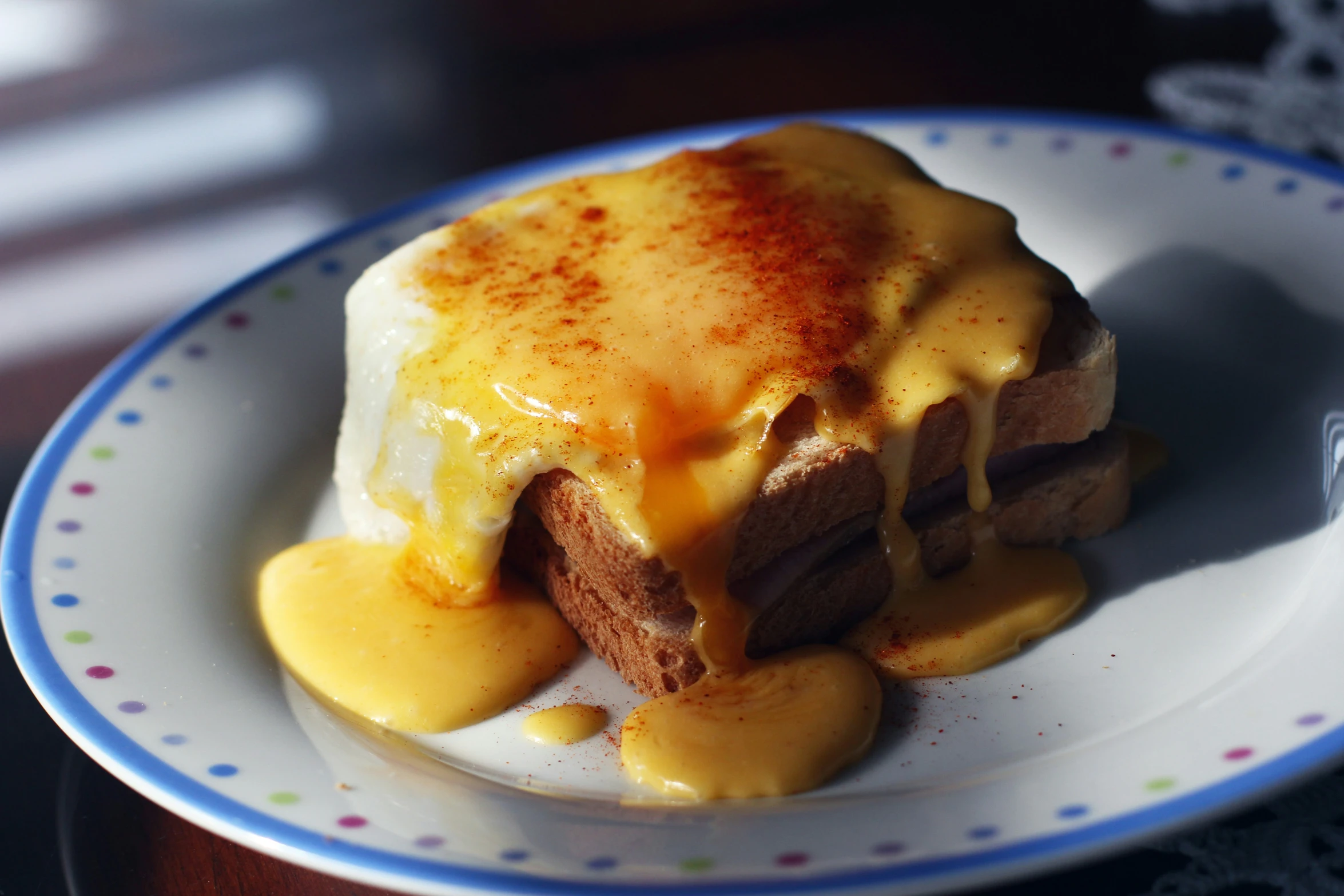 a piece of cake with cheese is on a plate