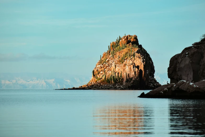 an island sitting on top of a large body of water