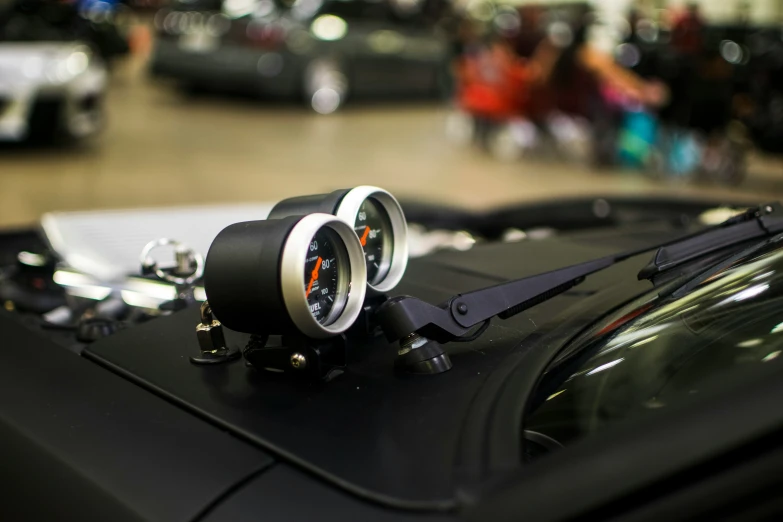 close up of vehicle dashboard with gauges on display