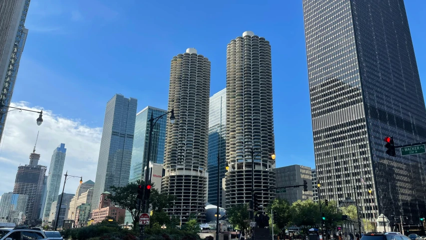 an intersection with tall buildings in the city