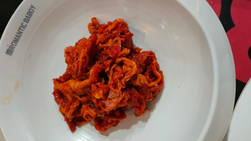 a close up of a bowl of food on a table