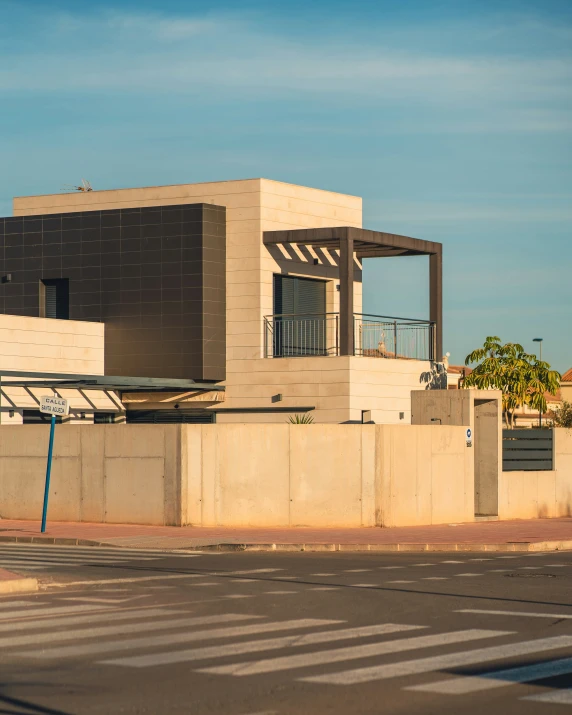 a modern, architecturely building stands near the intersection