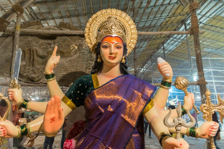 a statue in india in a shopping area