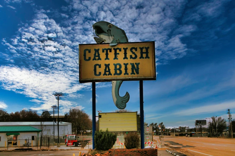a close - up of the cat fish cabin sign