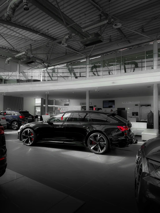 cars in the showroom lined up next to each other