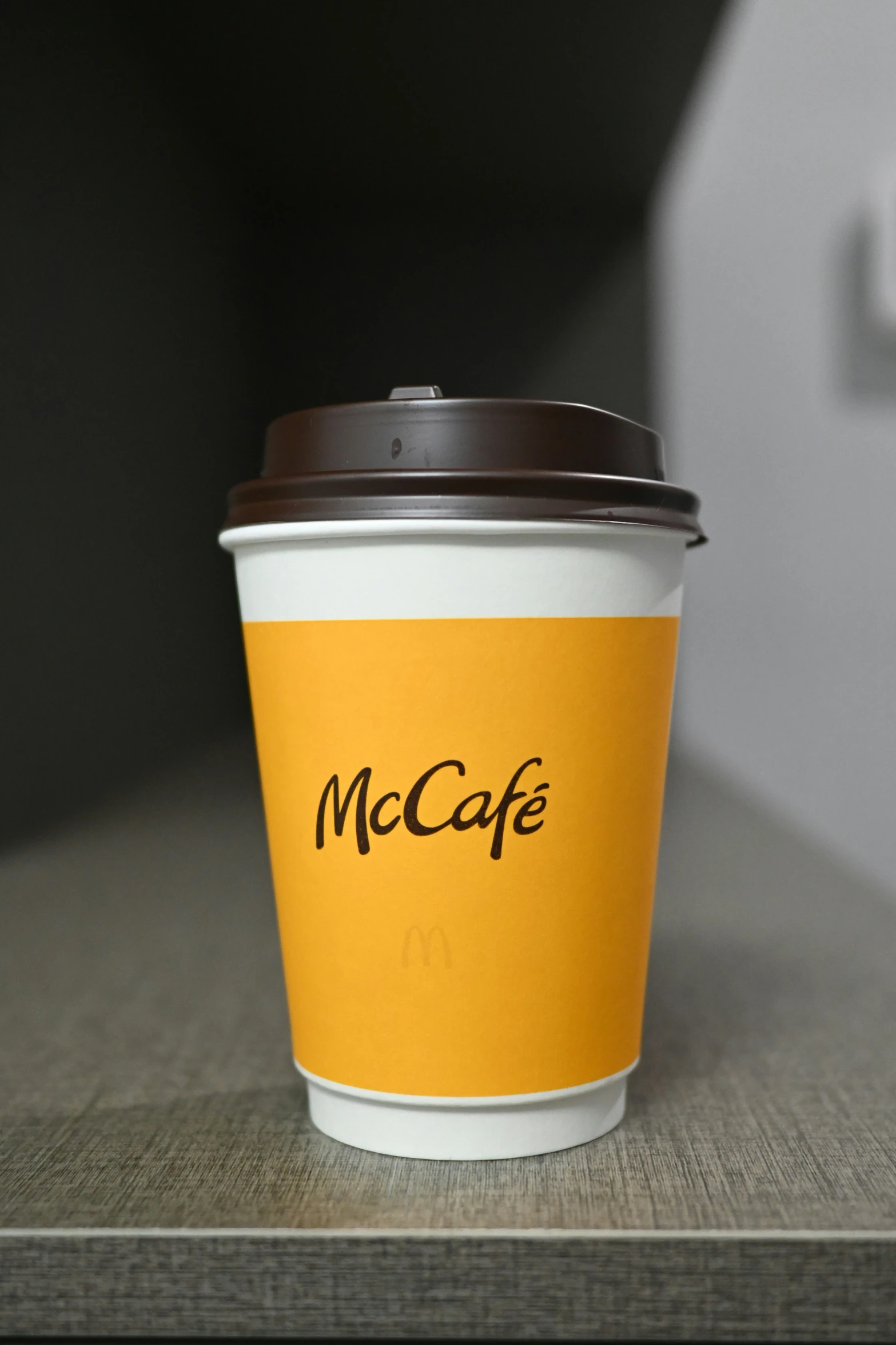 a coffee cup is on top of a table