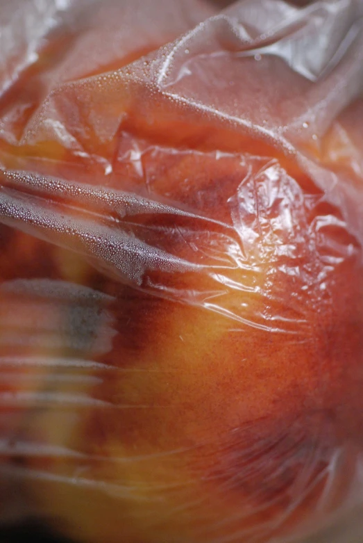 this is a closeup picture of apples in plastic