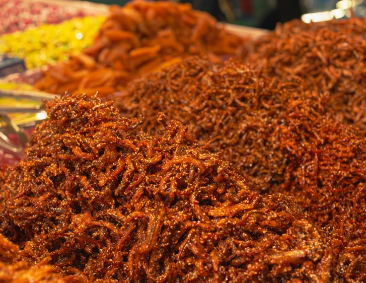 red colored items on display for sale in a market