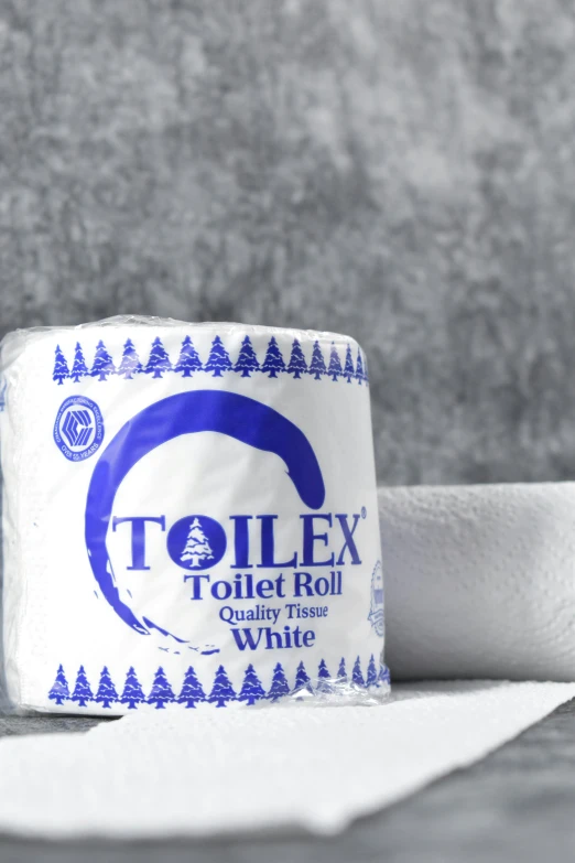 a roll of toilet paper sits on a table