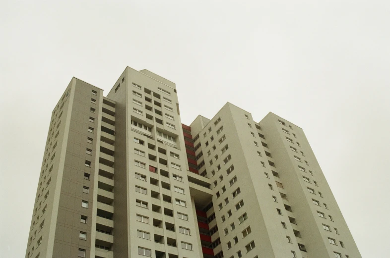 a large and tall building with windows on top of it