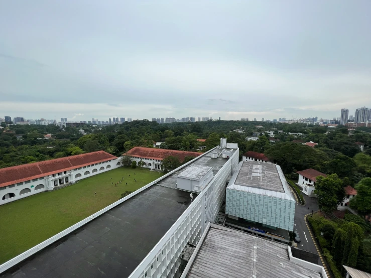 an aerial view of the roof of a building with red tile roofs