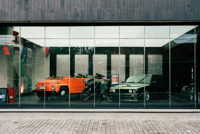 a car parked inside of a building with windows