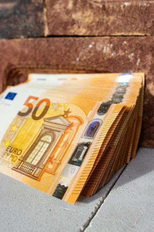 the twenty thousand euros bank note is laying on top of each other