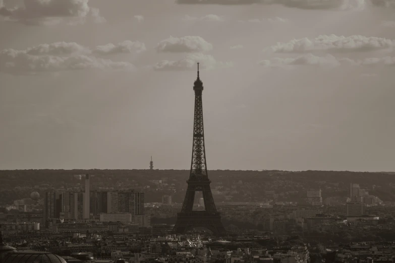 an eiffel tower towering above the city of paris