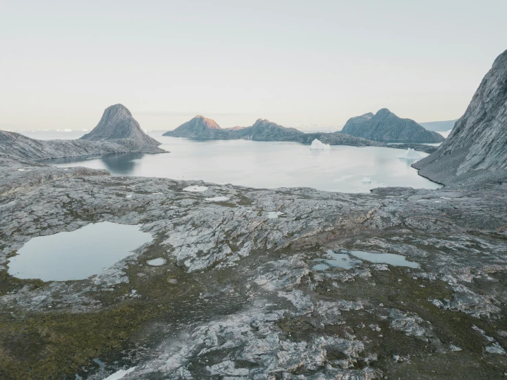 a lake sitting between two large mountains