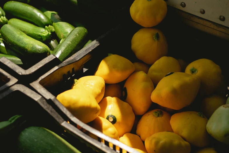 there are many fruits and vegetables on display in baskets