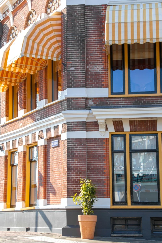 the outside of a building with a very long awning