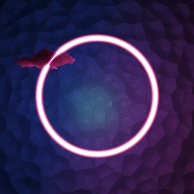 a ring is shown with a small pink circle in the middle