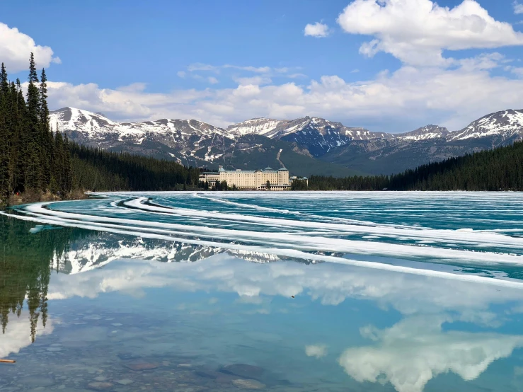 several large ice floes reflecting the landscape