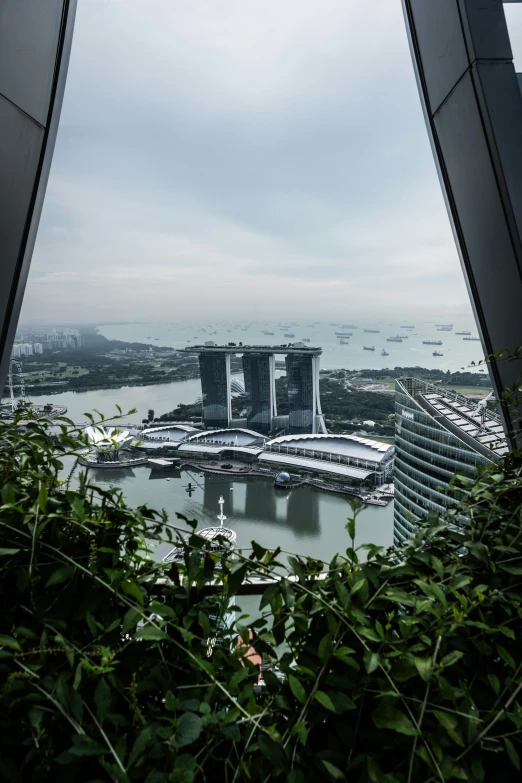 some tall buildings and water seen from across the bay