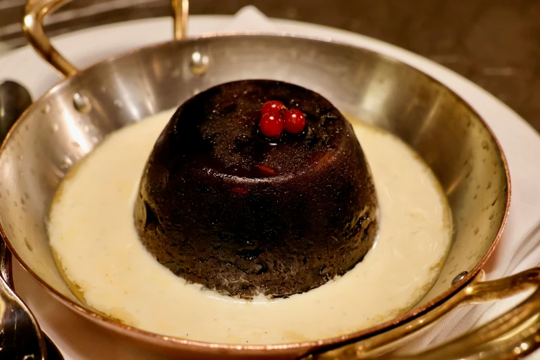 a dessert sitting on top of a metal plate